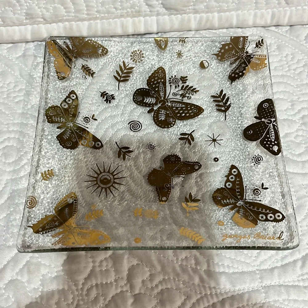 Set of four Georges‎ Briard square plates